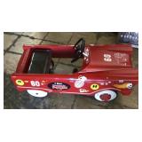 Red pedal car