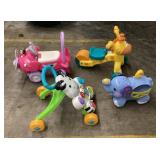 Assorted toddler riding and push toys