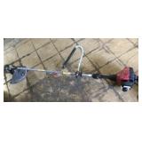 WeedEater with Snapper brush blade