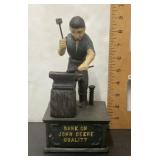 Cast iron John Deere blacksmith mechanical bank