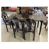 3x5 glass top table and 5 chairs