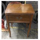 Sewing machine in cabinet