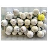 48 new and used golf balls