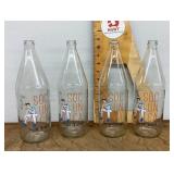 4 seltzer bottles