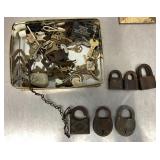 Padlocks and assorted keys