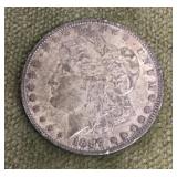1887 Morgan silver dollar