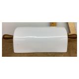 Ceramic lid with wooden handles