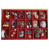Costume jewelry pendants, brooches, etc.