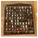 Thimble collection in display case