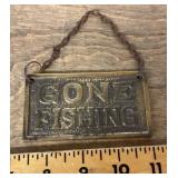 Brass gone fishing sign