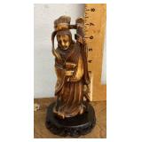 Carved resin Asian woman statue