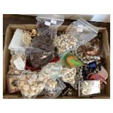 Flat of costume jewelry