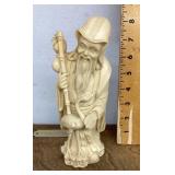 Carved resin Asian wide man statue