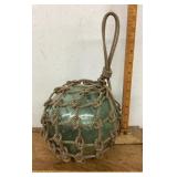 Huge glass fishing float with hand knotted rope