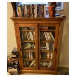 Media cabinet full of DVDs and VHS
