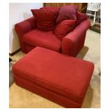 Oversize red upholstered chair and ottoman