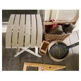 Patio side table, group of baskets and contents