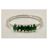 Sterling silver ring with 4 green stones