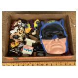 Flat of toys, etc. with Batman mask