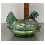 Green carnival glass hen on a nest