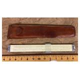 Pickett slide rule in leather holder