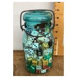 Blue glass jar of dice