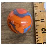 Large orange and blue swirl glass marble