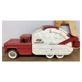 Structo pressed steel sanitation truck