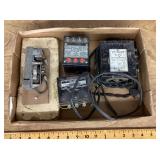 Flat of model train transformers and controls
