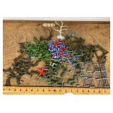 Collection of army men and playset pieces