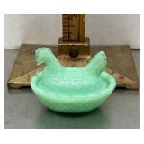 Mini green glass hen on a nest