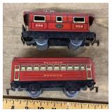 Pre-war tin plate caboose and pullman car