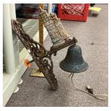 Cast metal bell and bracket