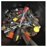 Half a bucket of hand tools