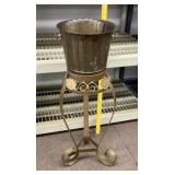Metal plant stand with pot