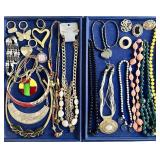 Costume necklaces, dress clips, keychains