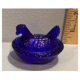Cobalt blue mini hen on a nest