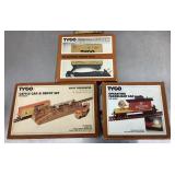 Boxed Tyco train cars and power pack