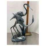 Cast iron cranes figure