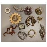 12 costume jewelry brooches