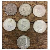 7 clad Kennedy half dollars