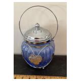Blue glass jar with with musical lid