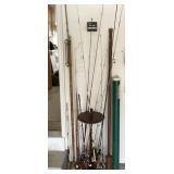 Collection of fishing poles and reels