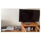 Insignia TV, VCR & other electronics on cabinet