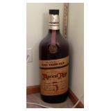 Large glass whiskey bottle