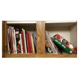 Cookbooks in upper kitchen cabinet