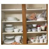 Dishes and contents of upper kitchen cabinet