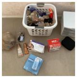 Contents of bathroom cabinet with laundry basket