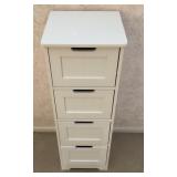 Small white laminate 4-drawer chest