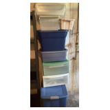 Stack of totes and organizers with lids
